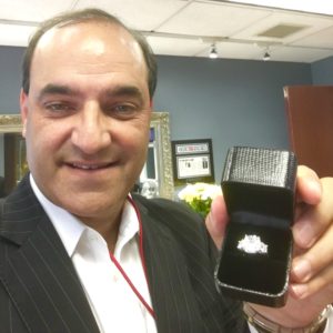 Richard Wasserman Holding Stunning 3 Stone Diamond Engagement Ring